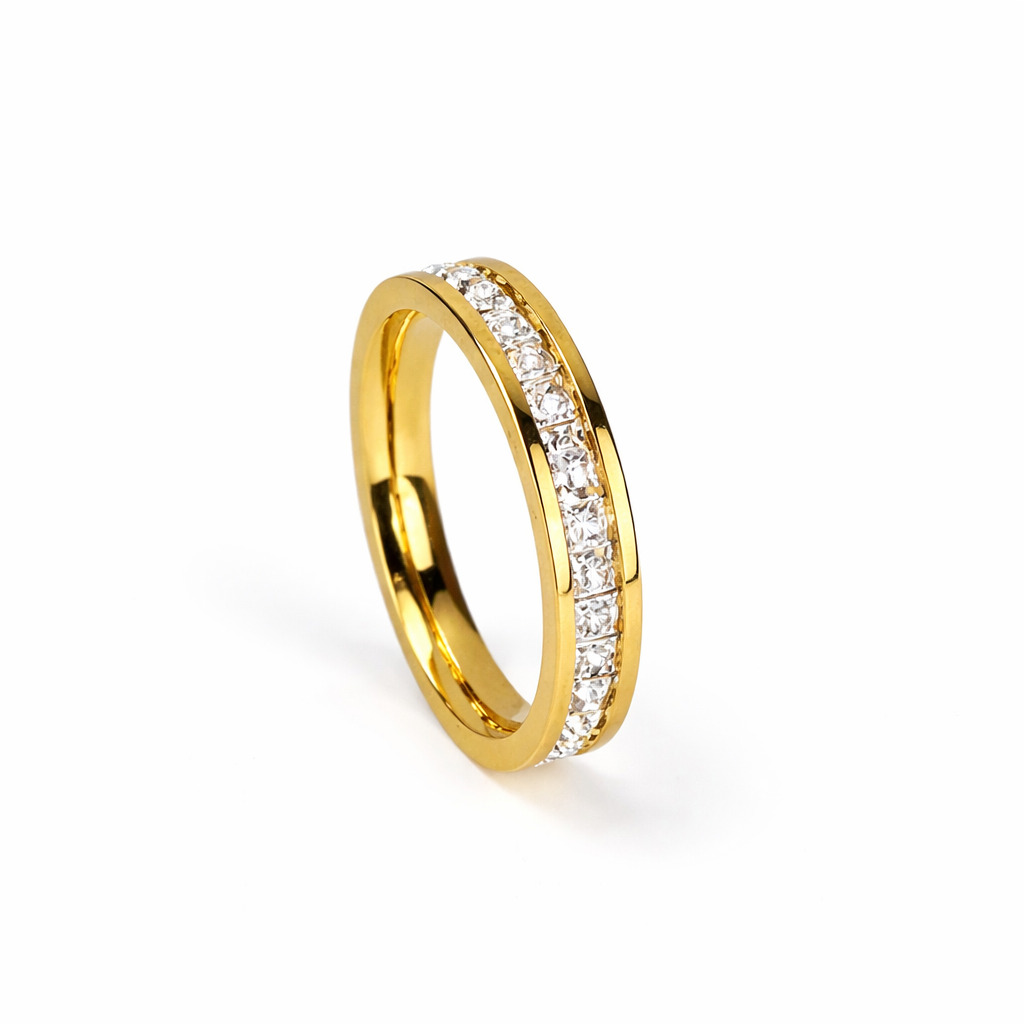 Gold ring with embedded diamonds on a white background